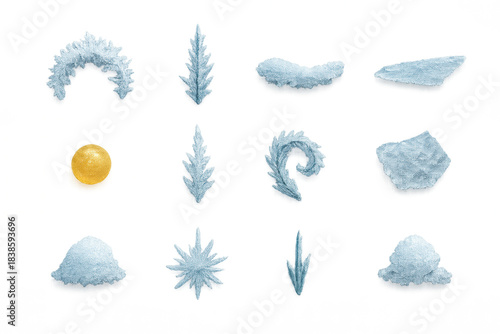 Artistic collection of various ice crystals and a golden sphere on a black background