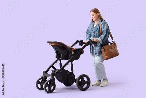 Young mother with rattle an...