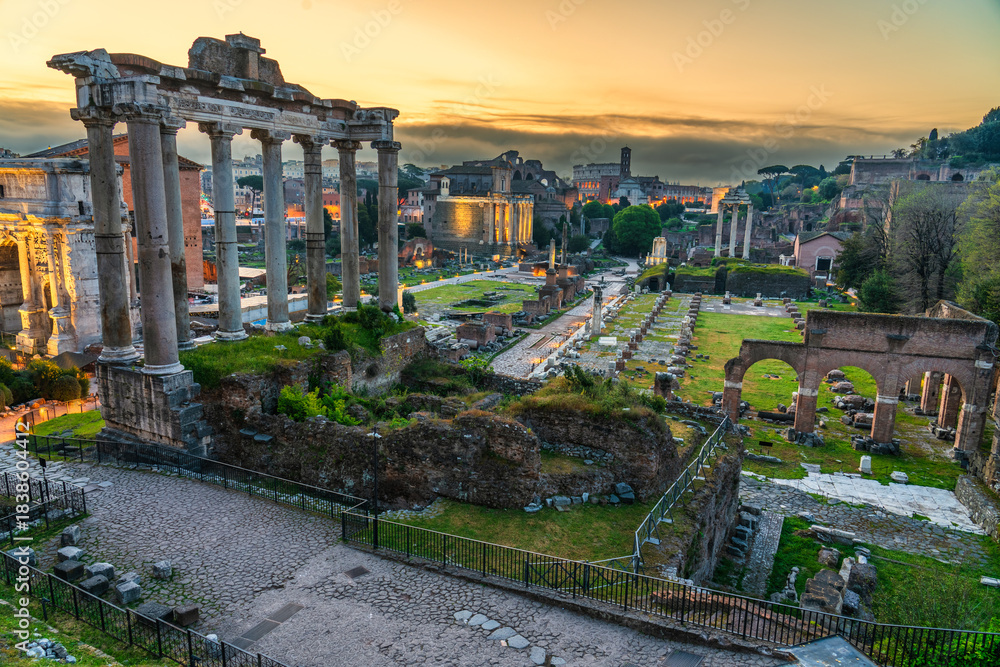 Naklejka premium Roman forum ruins at sunrise in Rome with Inscription