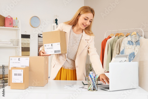 Female seller working with ...