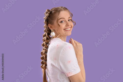 Smiling young woman with lo...