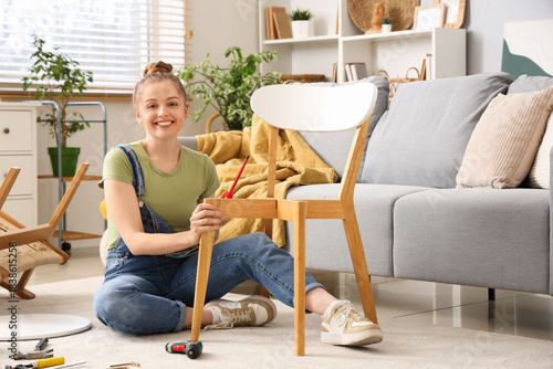 Smiling young woman assembl...