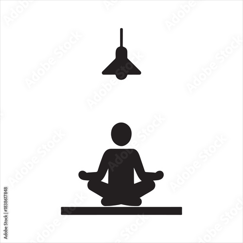 Person Meditating under a Hanging Lamp Simple Black and White Relaxation Scene Peaceful Moment Awareness Spiritual Practice
