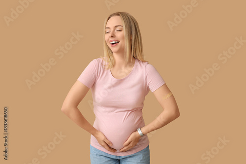 Young pregnant woman after ...