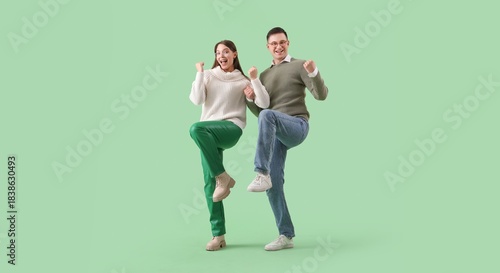 Happy young couple in warm ...