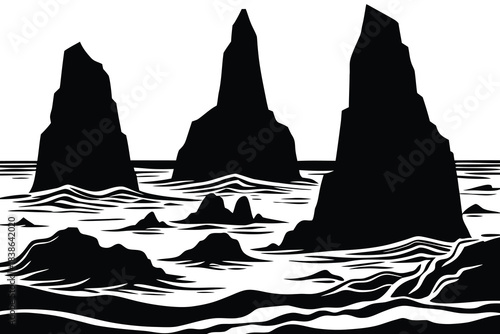 Dramatic jagged rock formations rise from the sea silhouette