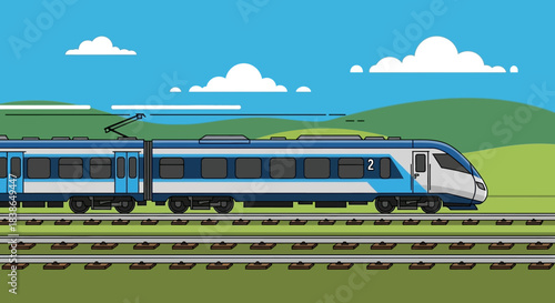 Blue and white train traveling through green landscape with blue sky