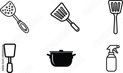 A comprehensive collection of diverse kitchen spatulas for various cooking tasks alongside