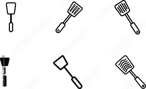 A versatile collection of kitchen spatulas in various styles including outline filled and slotted