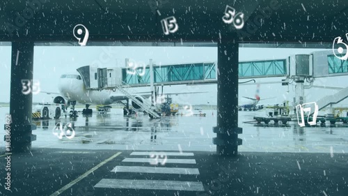 Animated numeric overlay appearing and sleet starting as ground crew moving to service jet