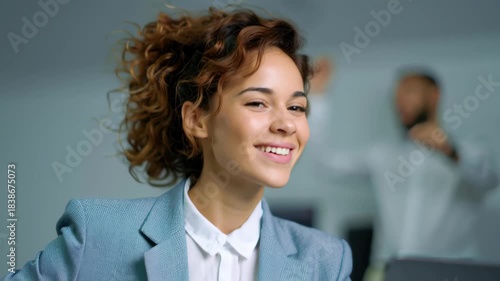 Confident woman leader work modern office, smiling with energy, business people collaborate bright workspace for success and growth, professional woman raising hand office meeting, teamwork focus