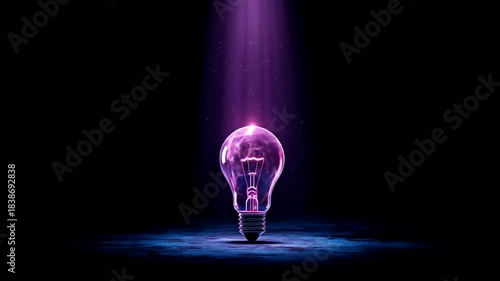 Glowing light bulb idea concept in purple light on dark background