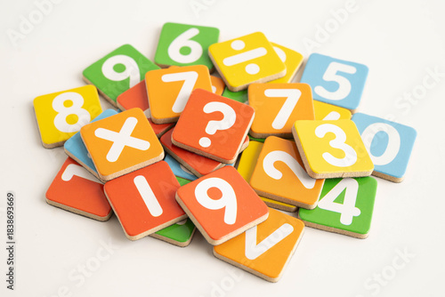 Number wood block cubes for learning Mathematic, education math concept.