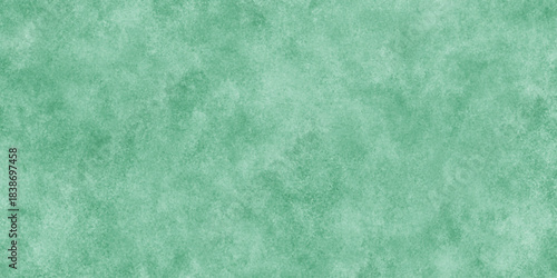 Abstract Elegant dark green background with mottled vintage texture in old fancy background design, texture of colored parchment paper.