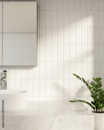 White marble sink counter table under mirror aside houseplant in bathroom with sunlight on tile wall