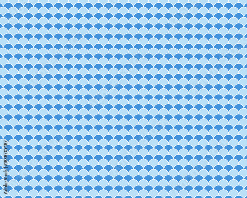 日本の伝統的な和柄である青海波のシームレスな背景パターン素材。青い海原の波を表現した幾何学模様で、無限に広がる波のように未来永劫の平穏と繁栄を願う吉祥文様。夏や和風のデザインに最適。