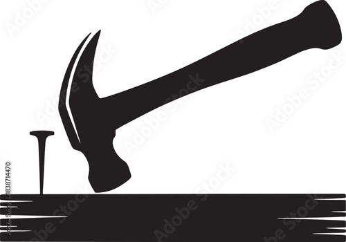 Hammer driving nail into old weathered wood construction tool repair equipment