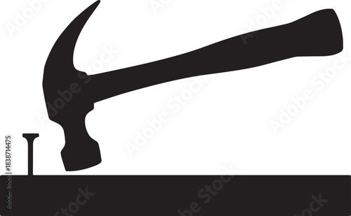 Hammer driving nail into wooden plank construction tool carpentry industry project