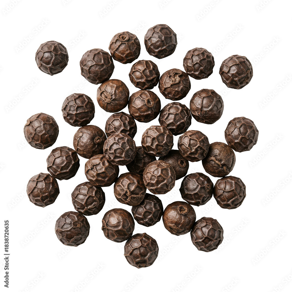Obraz premium Aromatic dark peppercorns scattered overhead view isolated on white background