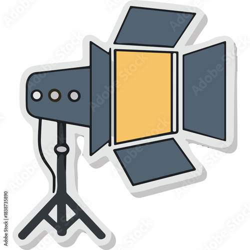 Studio Spotlight with Barn Doors on a Tripod Stand Emitting Warm Yellow Light Isolated on White Background Offering Directional Illumination for Photography or Film Production