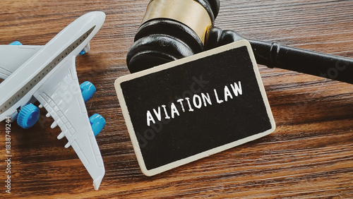 Aviation Law and Airline Regulation: Gavel and Aircraft Representing Legal Action in the Transportation Industry
