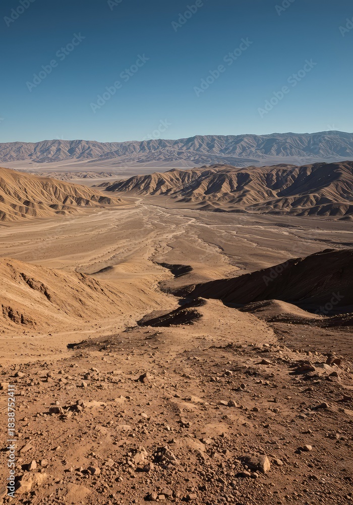 Fototapeta premium An extremely deep and expansive view of an arid, high-altitude landscape with rugged textures extending far to the distant horizon ,broad ,scope ,horizon