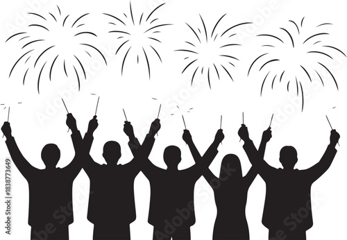 Silhouettes of people celebrating with sparklers and fireworks