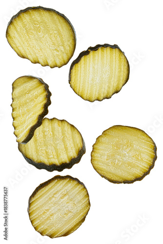 delicious wavy crinkle-cut dill pickle slices scattered artfully, showcasing their fresh appearance and readiness for use.