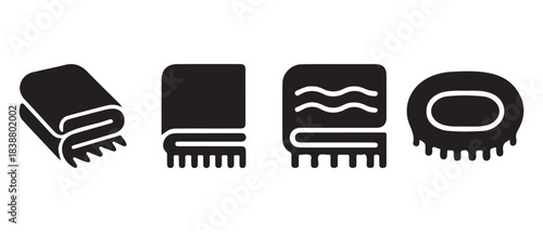 A collection of bath and spa icons including towels, bath mat, and bar of soap.