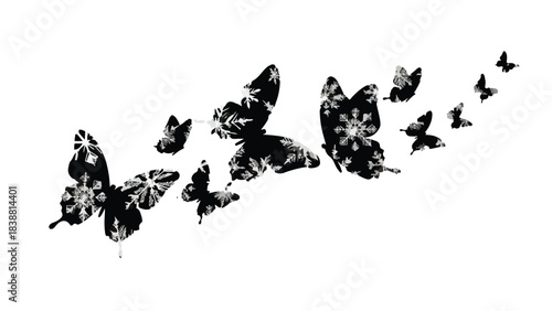 A flock of elegant black butterflies with intricate white patterns takes flight against a clean white background, symbolizing freedom and transformation.