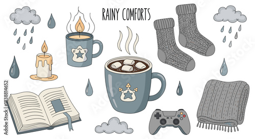 A cozy collection of rainy day comforts featuring hot chocolate, knitted socks, a blanket, burning candles, a book, and a game controller.