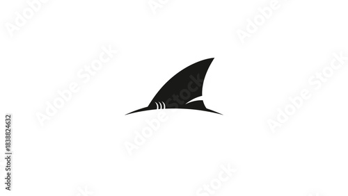 Black shark fin protruding from water against a plain white background.