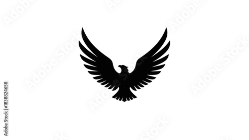 Black silhouette of an eagle spreading its wings on a white background.