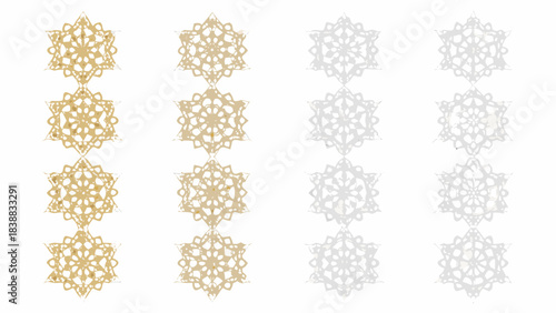 Arrangement of delicate golden and silver snowflake like ornamental patterns in rows