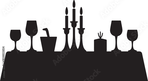 Black silhouette of a formal dining table setting with wine glasses and candles