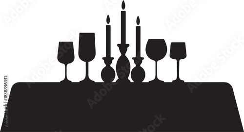 Black silhouette of wine glasses and candles on a table