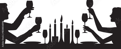 Couple toasting wine glasses at candlelit dinner silhouette