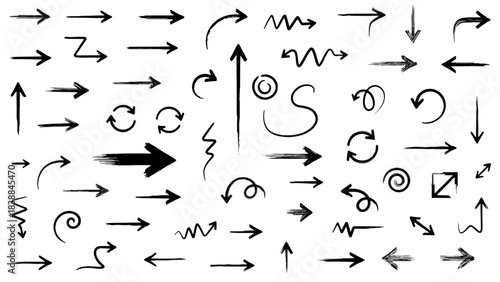 Collection of black and white arrows with various styles, curves, and directions, representing movement and directionality in graphic design elements
