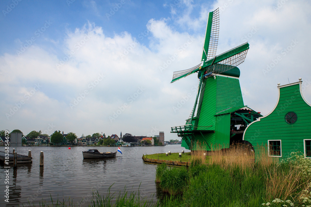 Fototapeta premium Windmills near Dutch village