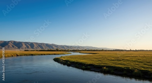 A winding river flowing strongly through a vast landscape, symbolizing the ultimate triumph and the successful end of a long journey ,flow ,valley ,successful
