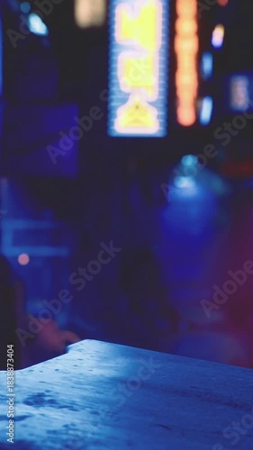 Wallpaper Mural Dimly lit streets are filled with colorful neon signs reflecting off wet surfaces, showcasing an energetic nightlife atmosphere. People can be seen enjoying the evening. Torontodigital.ca