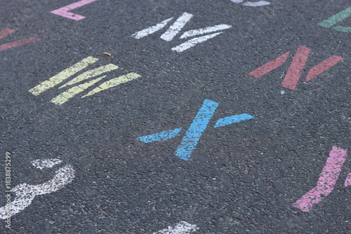 Fotografie Colourful alphabet letters painted on tarmac