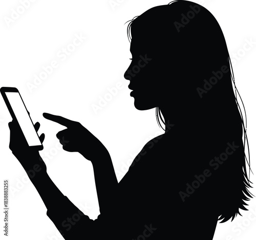 Silhouette of a woman using a smartphone in profile view