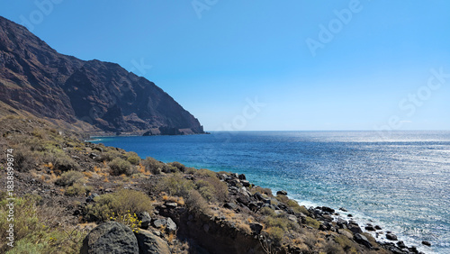 Volcanic west coastline leading to the vast blue Atlantic Ocean, Island El Hierro, Canary Islands, Spain, Europe.