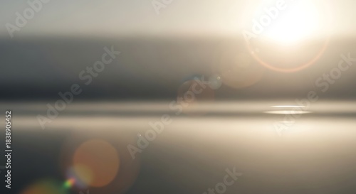 Golden Sun Flare and Bokeh Effects on Blurred Abstract Background