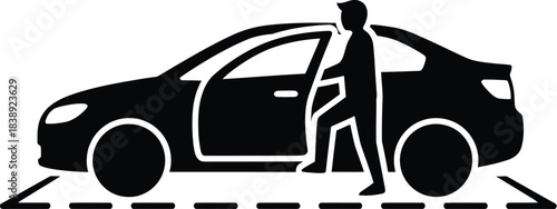 Silhouette of a person exiting a car in a parking space