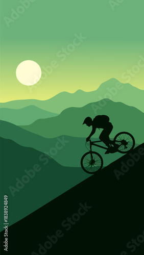 Silhouette of a mountain biker descending a steep, grassy slope against a backdrop of layered green mountains and a bright sun.