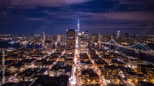Aerial View of San Francisco Skyline at Night, Illuminated City Lights Across the Bay, California