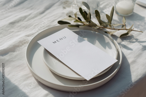 Minimalist table setting with blank menu card