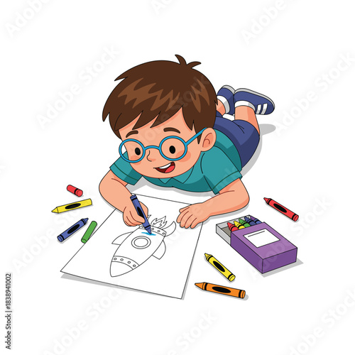 A happy little boy with glasses lies on the floor, enthusiastically coloring a rocket drawing with crayons. Promotes creativity and imagination